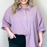  A lovely lavender shirt, perfect for any occasion.