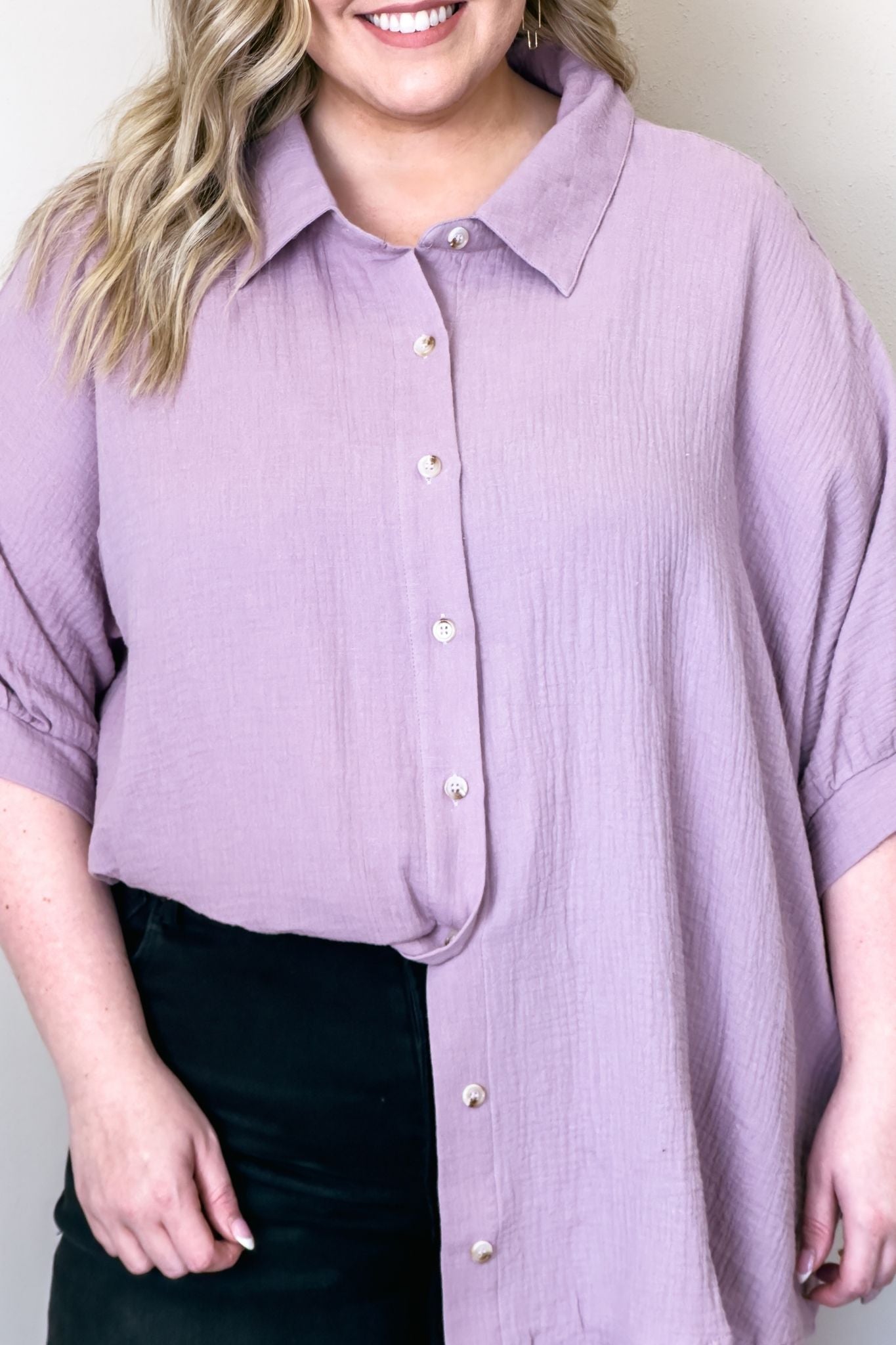  A lovely lavender shirt, perfect for any occasion.