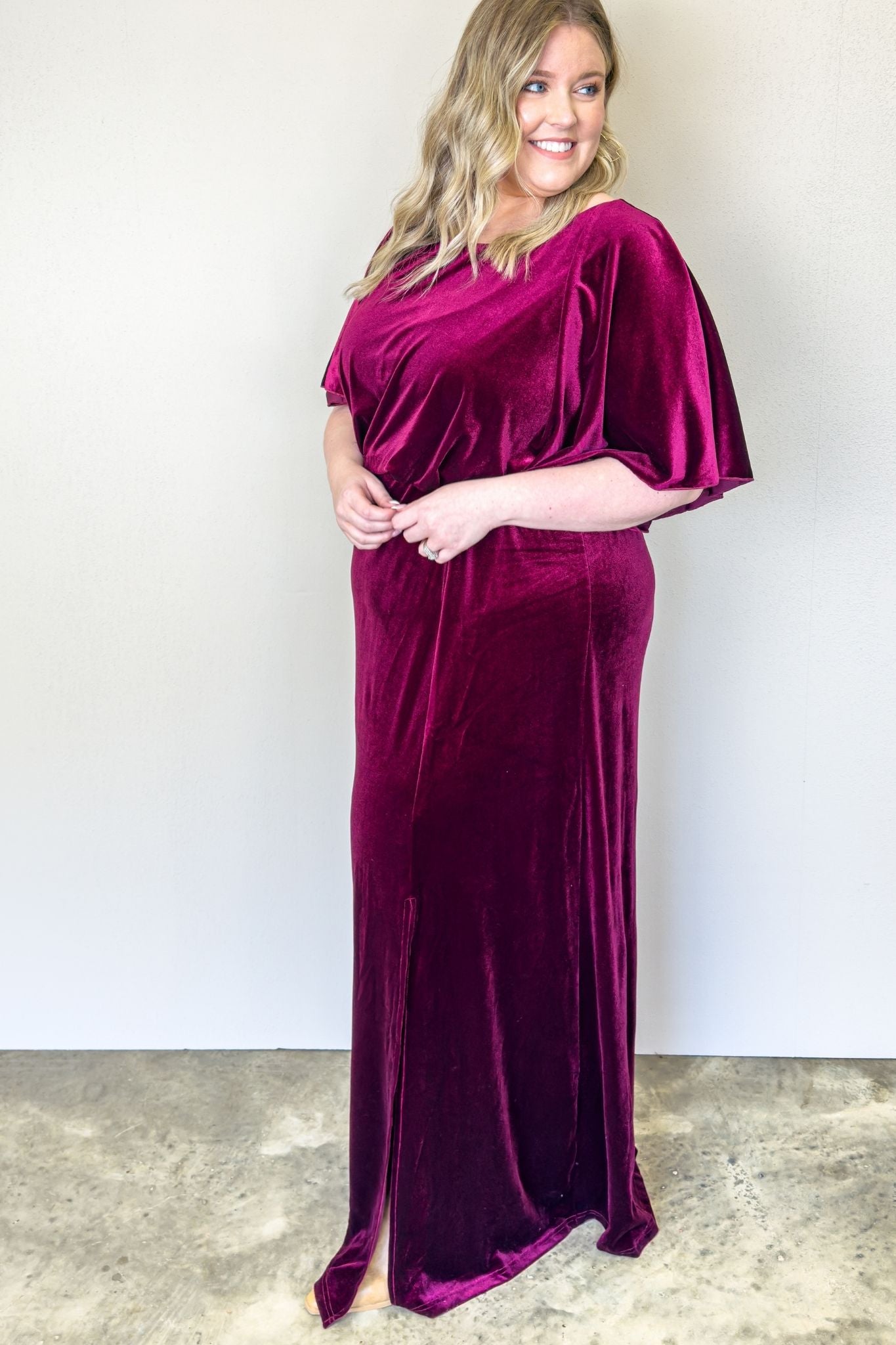 A stunning burgundy velvet dress, perfect for any occasion. Its rich color and luxurious fabric make it a must-have in your wardrobe.