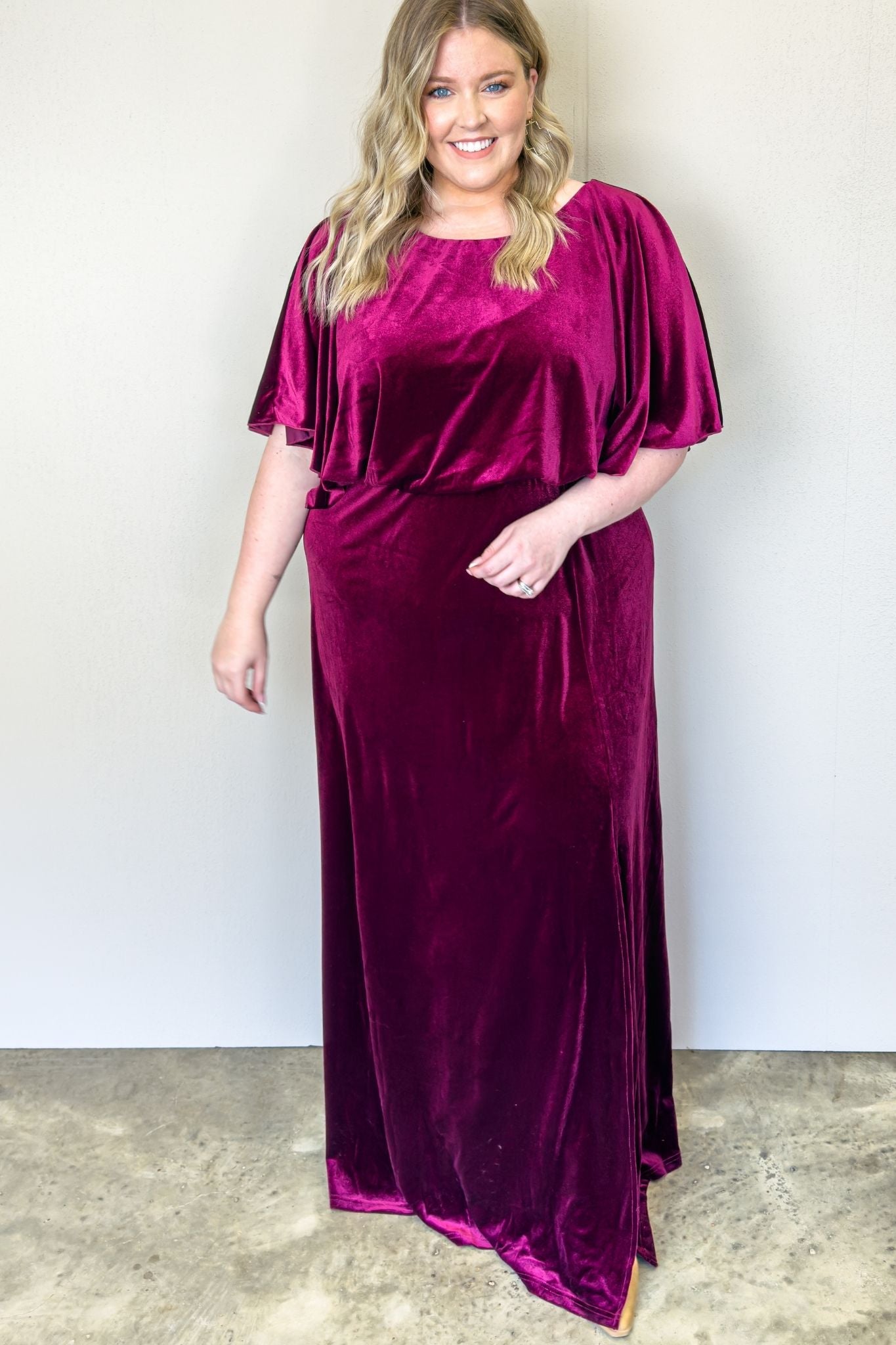 A stunning burgundy velvet dress, perfect for any occasion. Its rich color and luxurious fabric make it a must-have in your wardrobe.