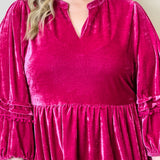 A stylish pink velvet blouse for any occasion