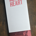 A notepad with the words "Bless Your Heart" on it, ideal for lists, ideas, and reminders - a perfect gift option.