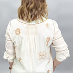 Ivy Jane ivory Milagro blouse, back view with bronze embroidery, gathered detail and contrast stitching.