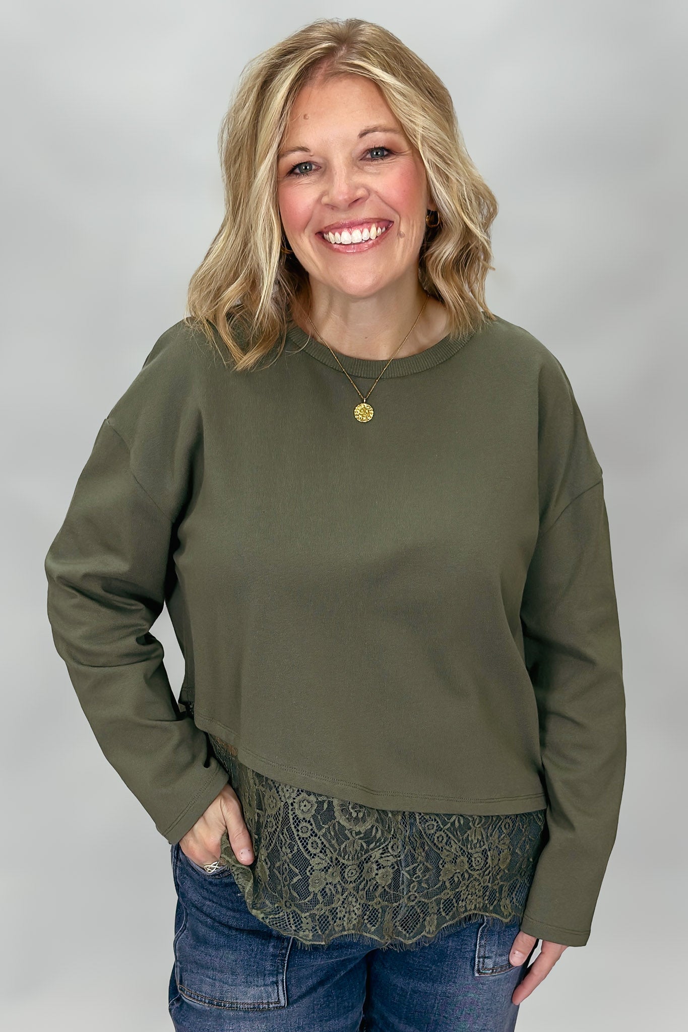 Entro army green crew neck top with long sleeves and lace hem detail