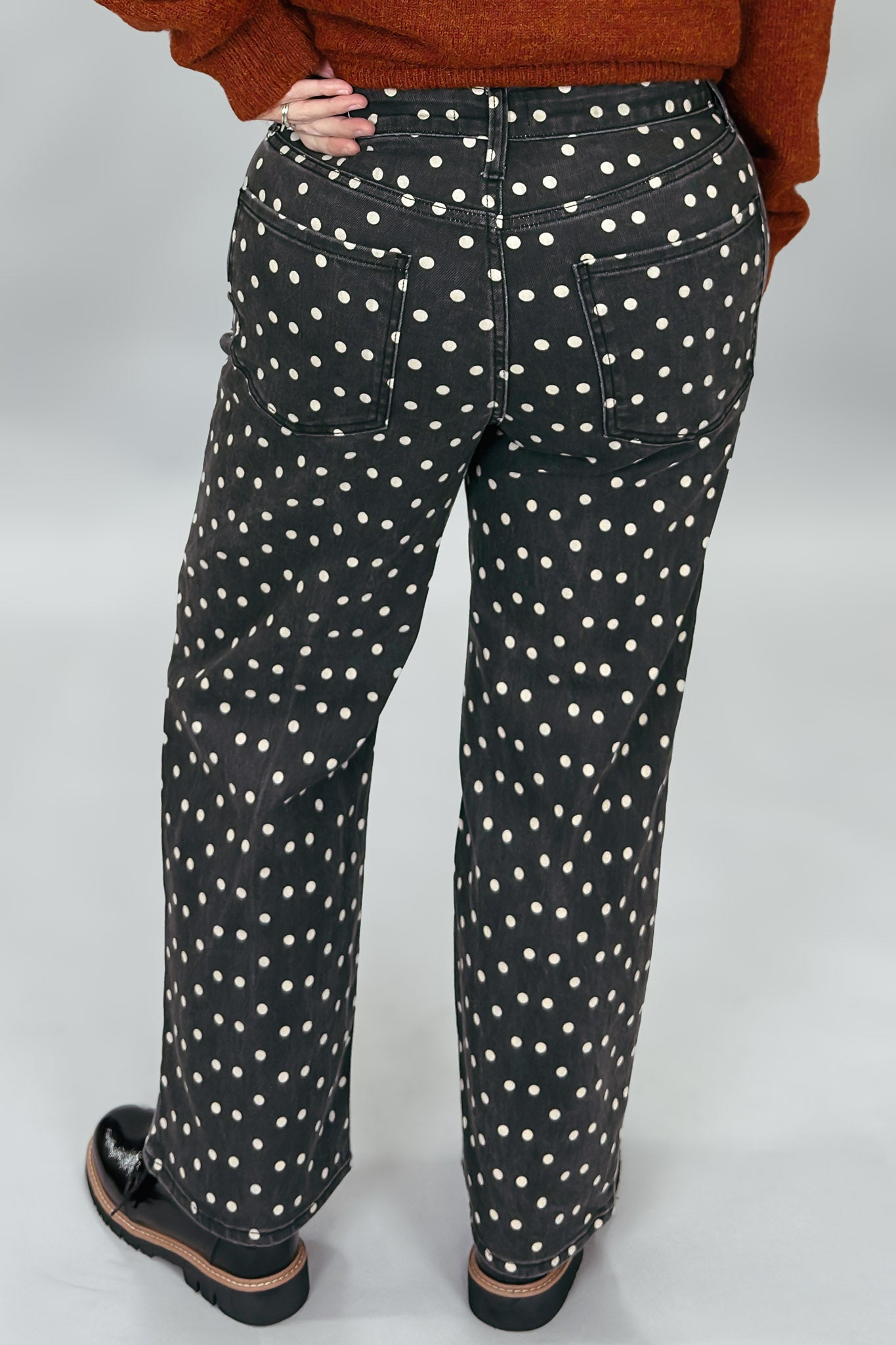 Just Black Denim black straight-leg jeans with cream polka dots; back view.