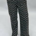 Just Black Denim black straight-leg jeans with cream polka dots; front model view.