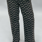 Just Black Denim black straight-leg jeans with cream polka dots; front model view.