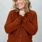 Compania Fantastica rust crewneck button-front cardigan; front model view.