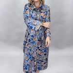 Uncle Frank blue floral satin midi dress with collar and waist tie; angled model view.
