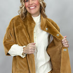 Ivy Jane camel faux fur cape with concealed snaps and patch pockets; open front showing concealed snap closures.