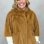 Ivy Jane camel faux fur cape with concealed snaps and patch pockets; front model view.