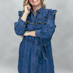 Ivy Jane blue denim mini dress with ruffled yoke and waist tie; angled model view.