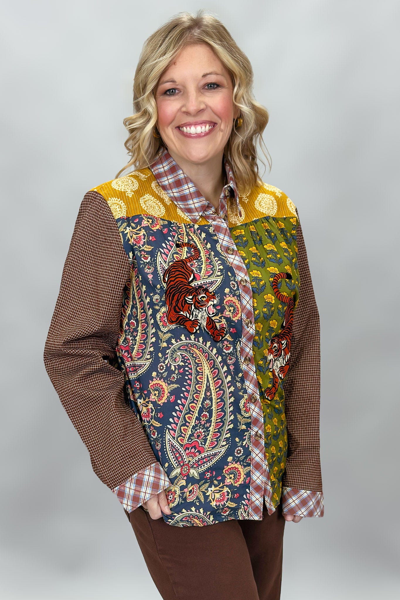 Ivy Jane tiger patchwork button-down with plaid collar and cuffs; angled model view.