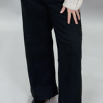 Just Black Denim black wide-leg jeans with front seam detail; front model view.