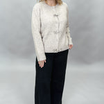 Just Black Denim black wide-leg jeans with front seam detail; outfit styling suggestion.