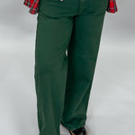 Just USA forest green straight-leg jeans with front and back pockets; front model view.