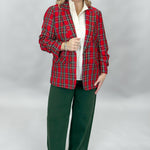Just USA forest green straight-leg jeans with front and back pockets; outfit styling suggestion.