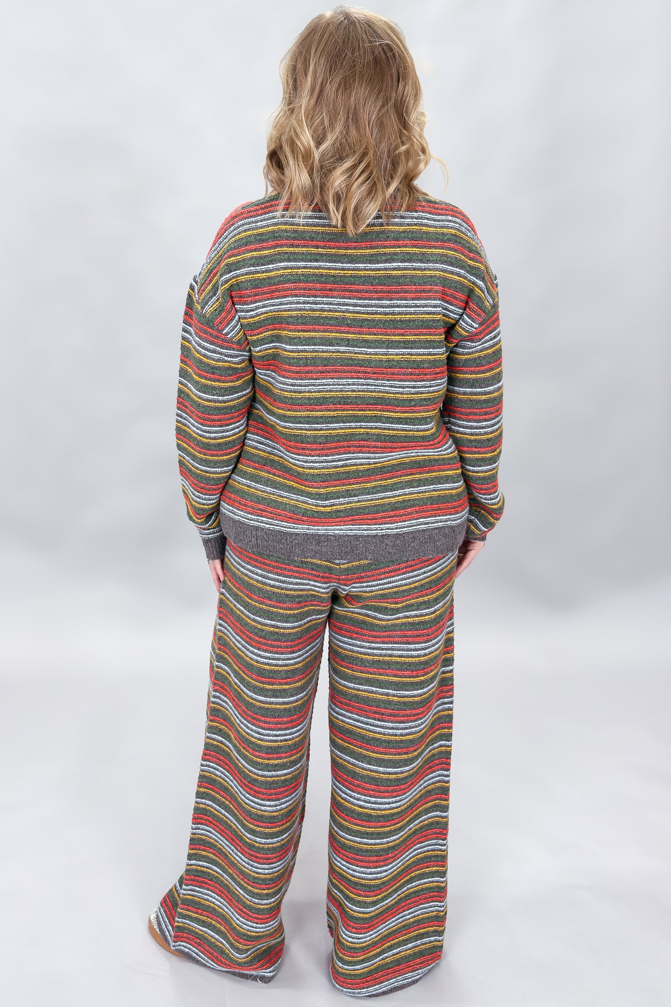 Compania Fantastica multicolor striped sweater and wide-leg pants set; back view.