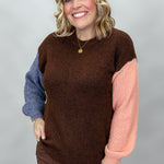 Compania Fantastica mocha sweater with blue and pink sleeves; front model view.