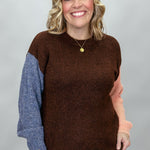Compania Fantastica mocha sweater with blue and pink sleeves; front model view.