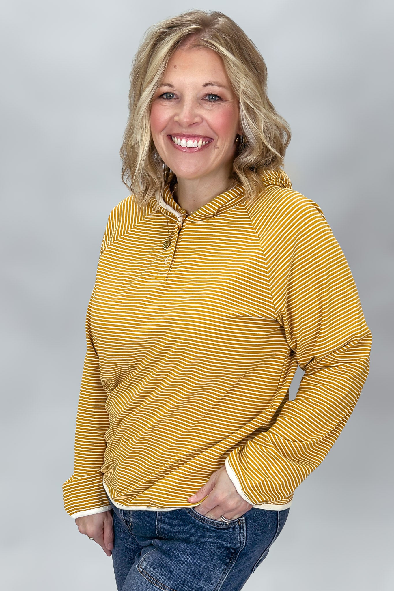 Staccato mustard hooded top with striped pattern