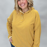 Mustard striped hoodie with button-front closure and contrast detail