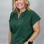 Entro Simple Romance sleeveless V-neck green pleated top, side view