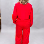 FATE red crewneck top and wide-leg pants set with pink stripes; back view.