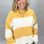 Mustard and ivory colorblock knitted sweater, styled view