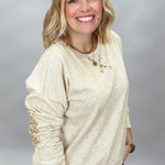 Oatmeal micro-brushed crewneck sweatshirt with floral patches