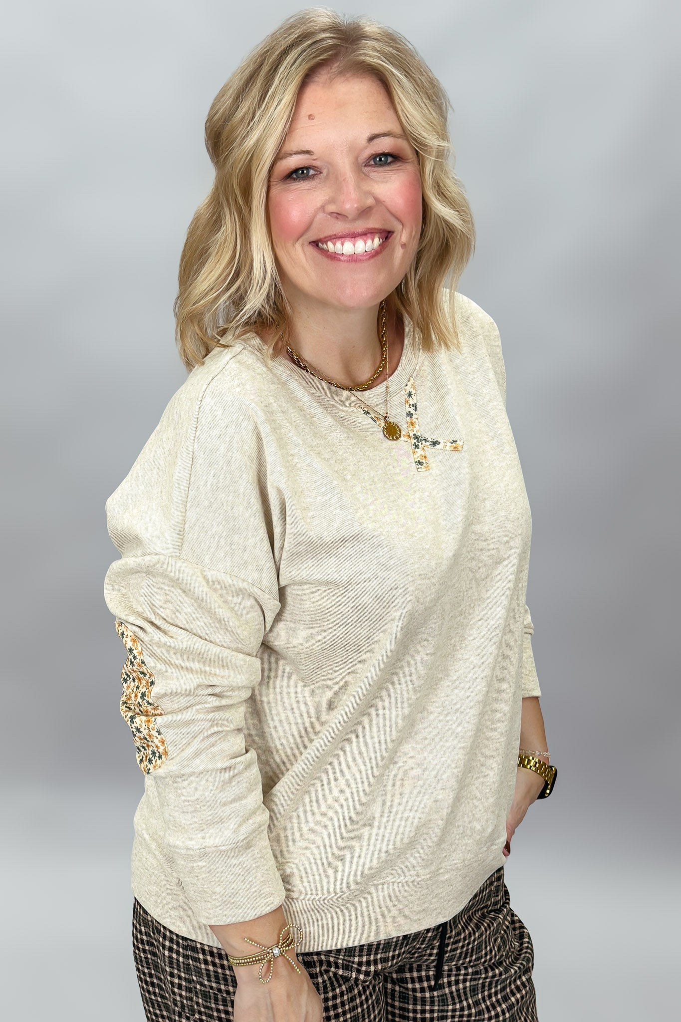 Oatmeal micro-brushed crewneck sweatshirt with floral patches