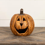 8-inch terracotta Big Mouth Pumpkin with triangular eyes and an open smiling mouth
