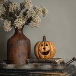 5.5-inch terracotta-colored Big Mouth Pumpkin displayed beside a vase; display suggestion, vase and other items not included