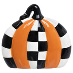 Orange ceramic pumpkin sitter with black-and-white checks and curved black stem